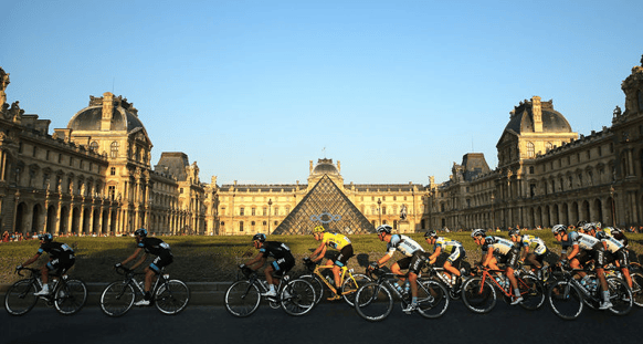Chris Froome with peloton enters Paris