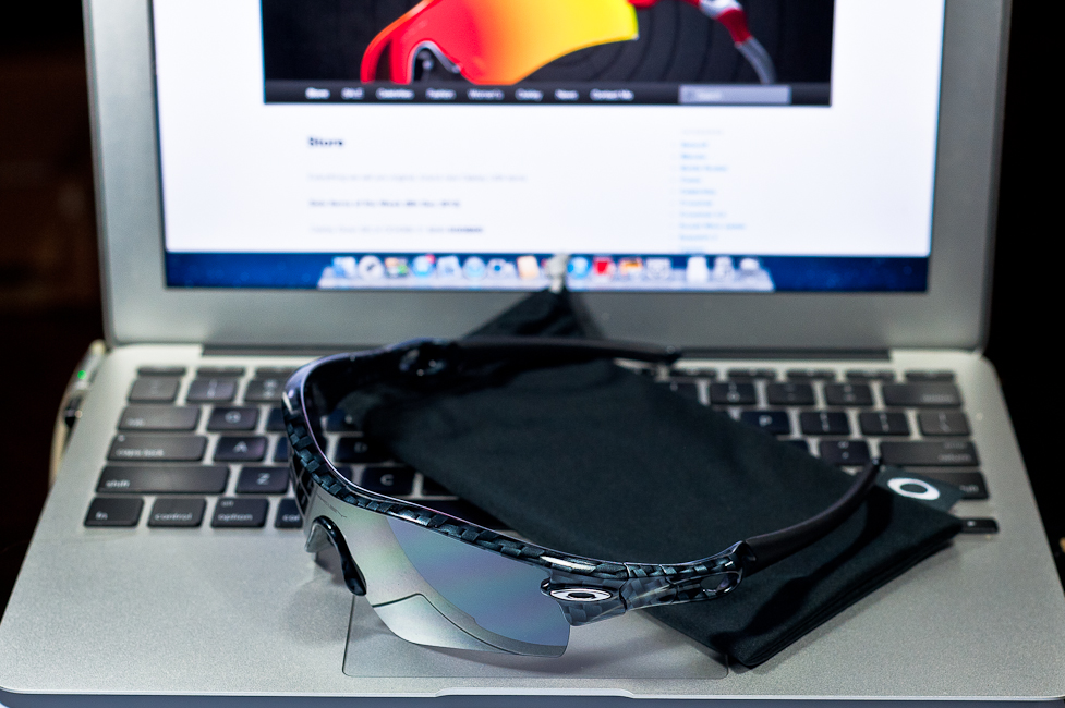 SGD$260 Oakley Custom RadarLock by wahliao.com Singapore Color: Carbon Fibre/Black Iridium. Purpose: For athletes, bright Singapore sun conditions Set as pictured.